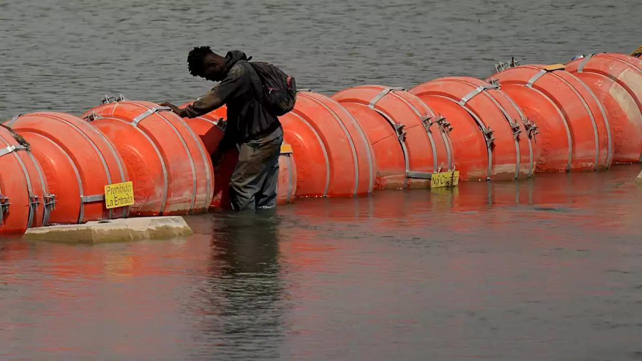 Court order allows Texas' floating barrier on US-Mexico border to remain in place for now