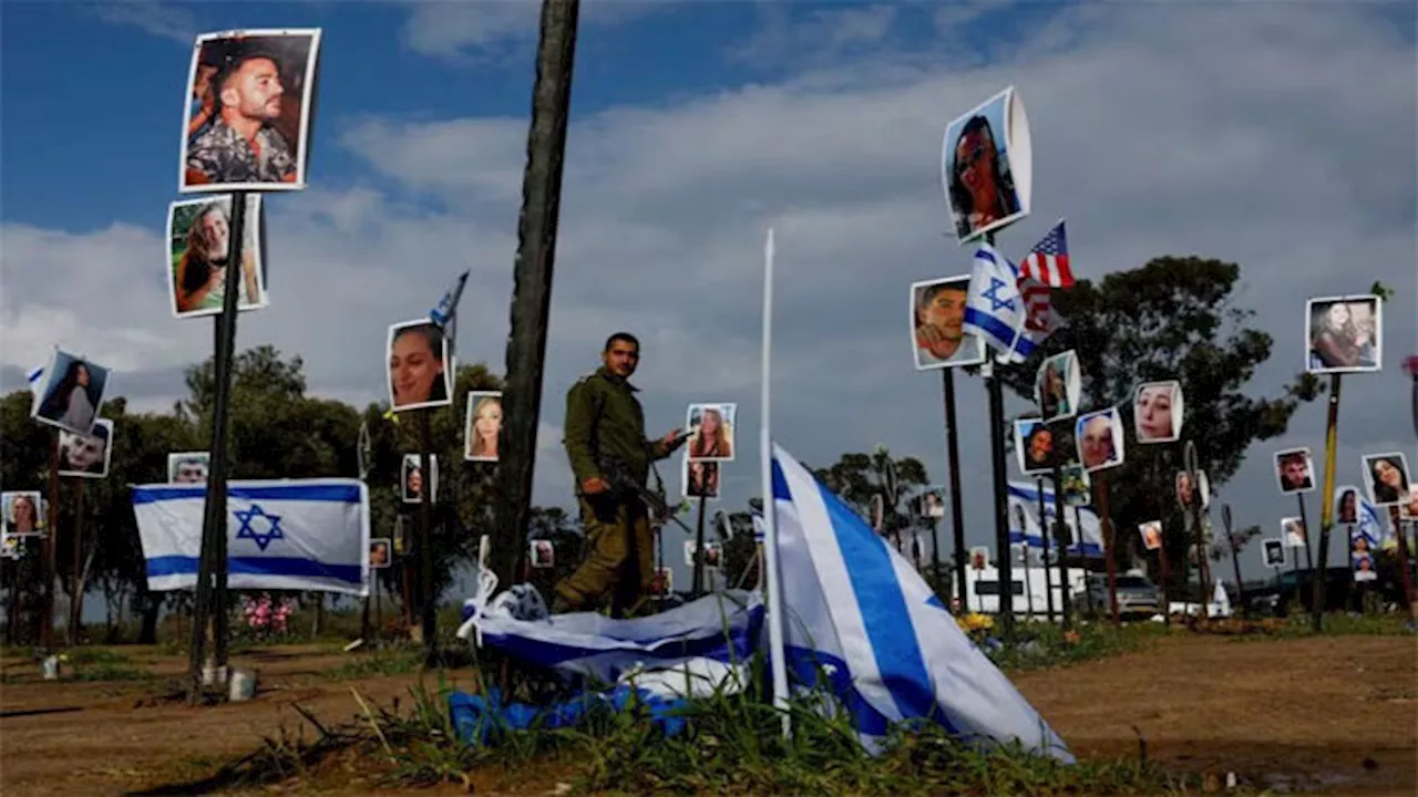 Hamas appears to show dead bodies of two hostages after warning Israel