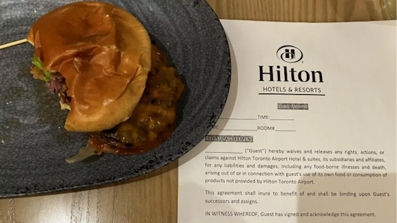 Cheeseburger Served with Waiver at Toronto Hotel Restaurant