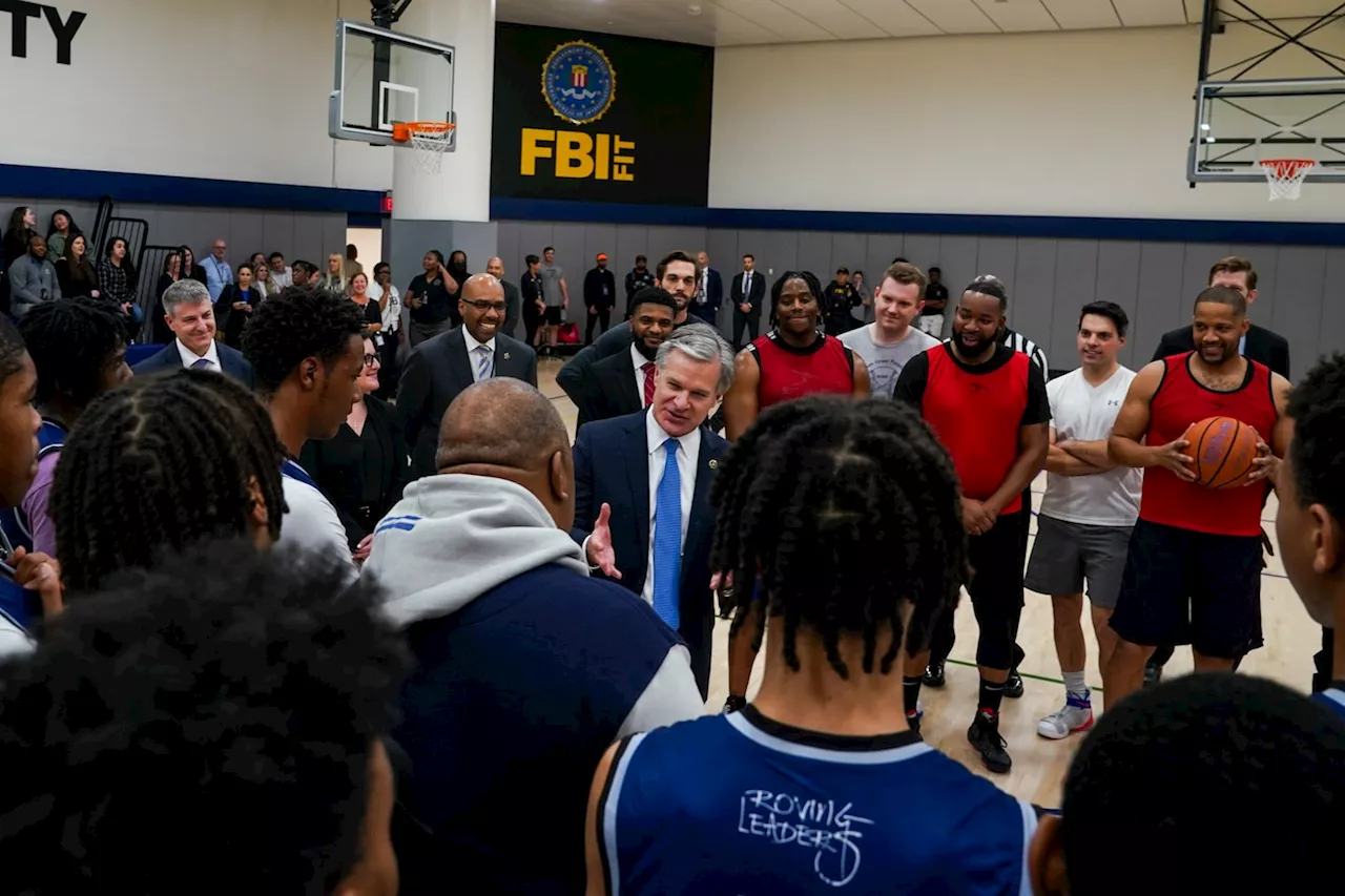 FBI Director cheers on basketball team against high schoolers