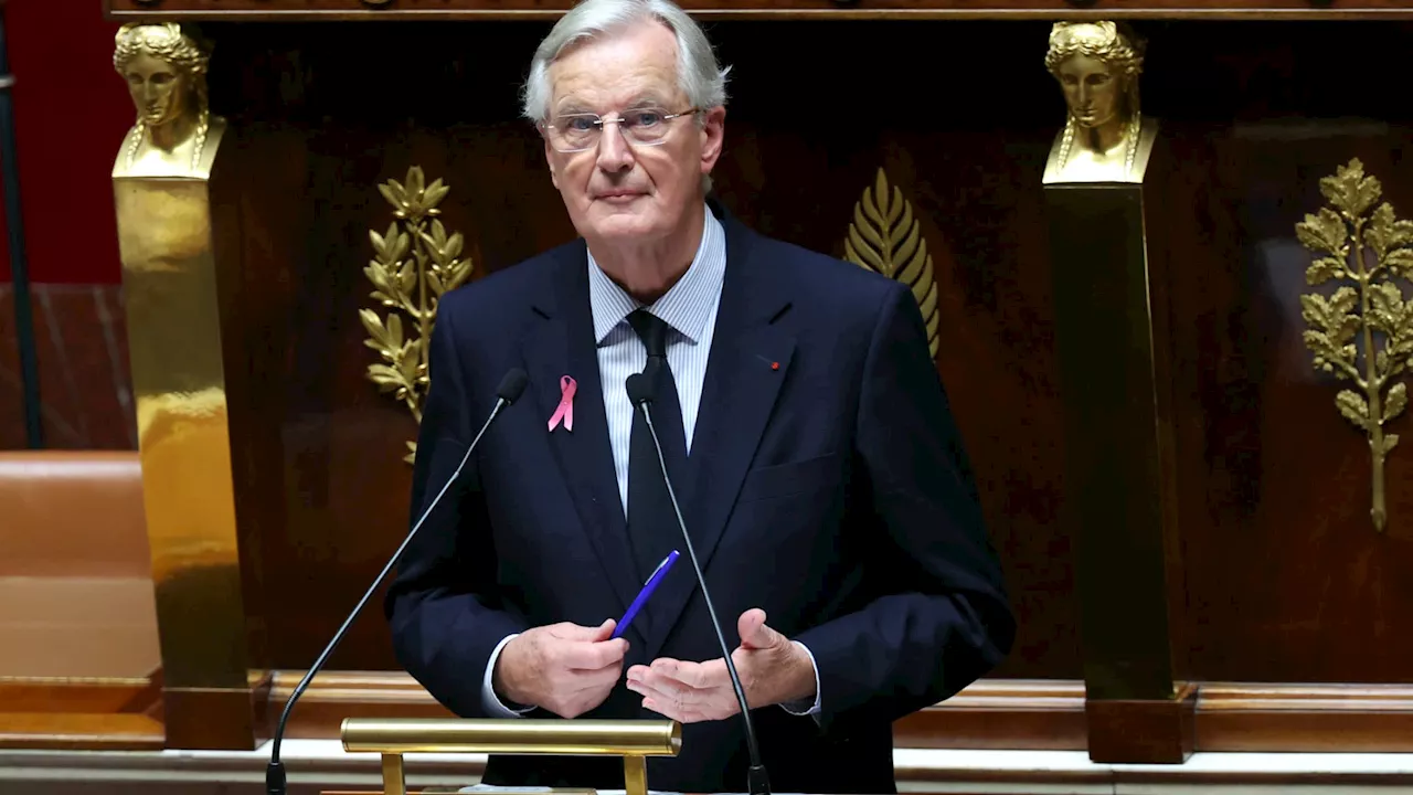 Pourquoi Michel Barnier portait-il un ruban rose lors de son discours à l'Assemblée nationale?