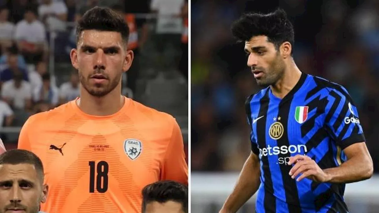 Israele-Iran a San Siro, il portiere Glazer (Stella Rossa) prova a fermare l'interista Taremi