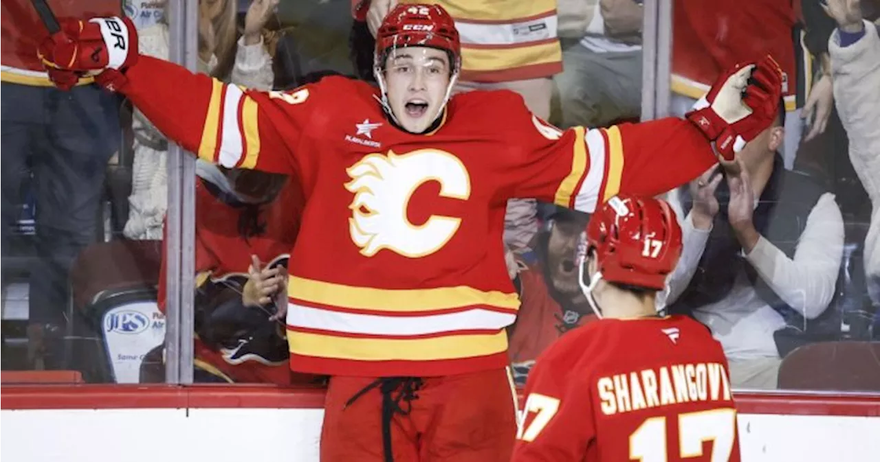 Honzek helps hot Flames beat Kraken 4-3 in OT