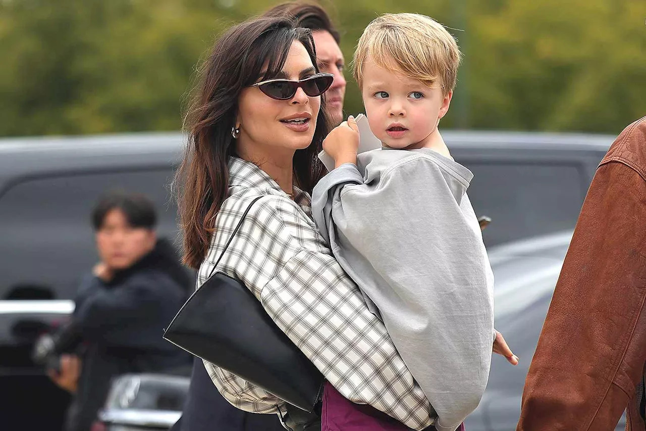 Emily Ratajkowski Carries Her Son Sylvester, 3, as She Attends Loewe Fashion Show in Paris