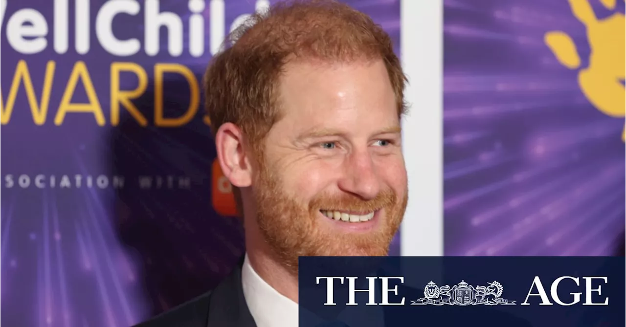 ‘You little legends’: Prince Harry all smiles on his return to the UK