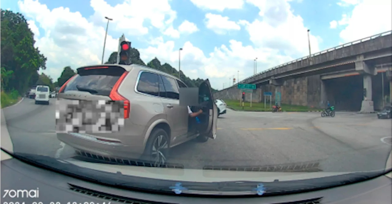 Volvo driver cuts queue, spits on road, runs red light