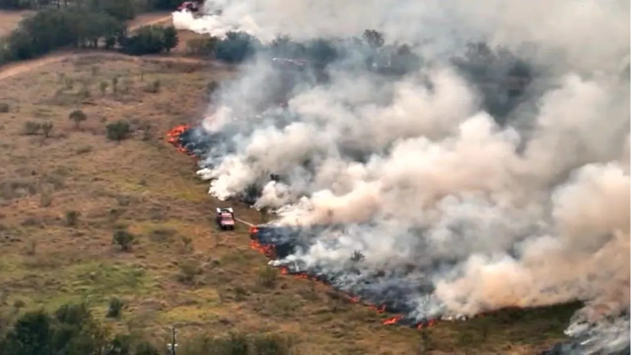 Over 100 firefighters battle E Austin brush fire