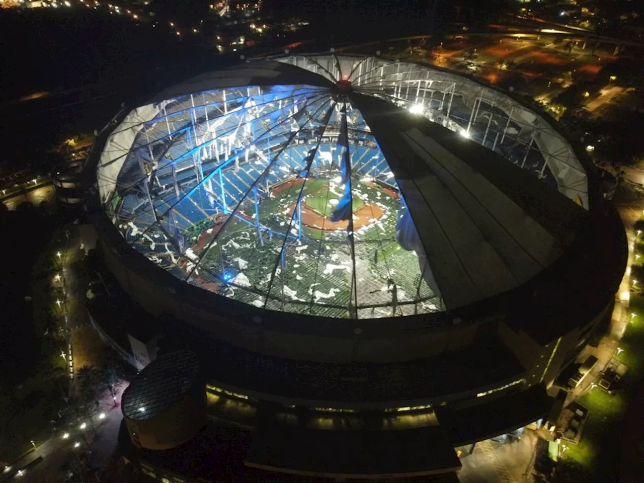 Hurricane Milton shreds roof of Tampa Bay Rays’ Tropicana Field