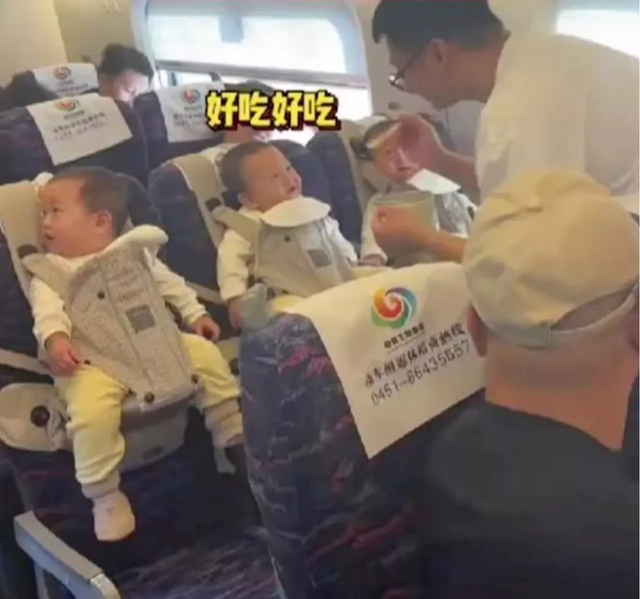 Praise for fuss-free ‘hanging’ China baby triplets on high-speed train with dad