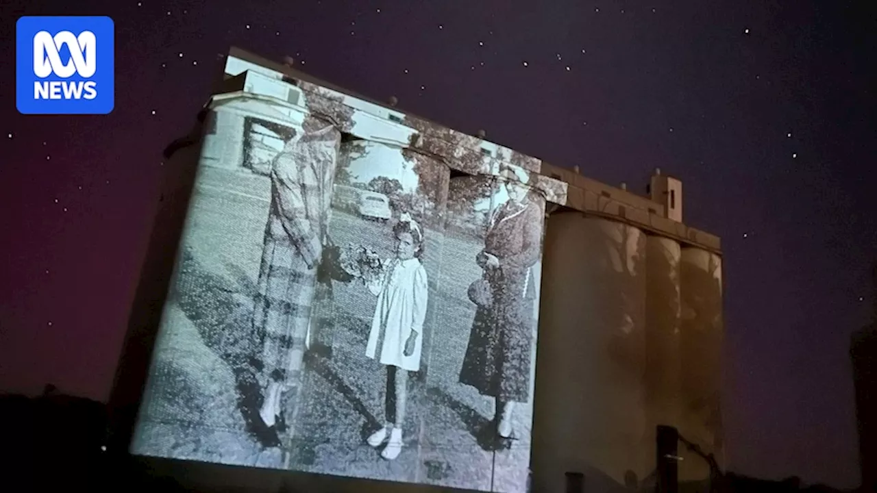 Minnipa's history projected on silos by family with a heartfelt town connection