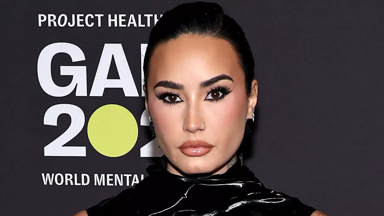 Demi Lovato looks fierce in sexy vinyl dress for Project Healthy Minds' World Mental Health Day Gala...