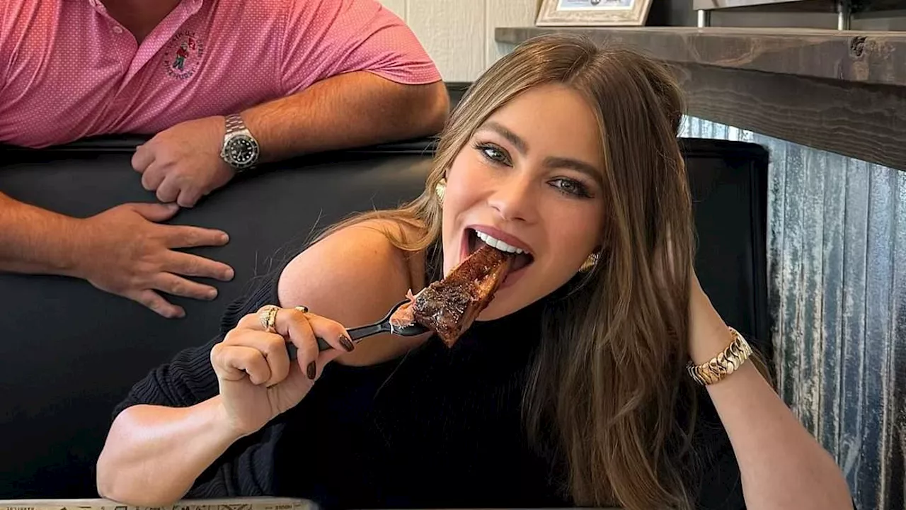 Sofia Vergara dons slinky black dress as she eats ribs at an Arkansas Walmart after arriving in a...