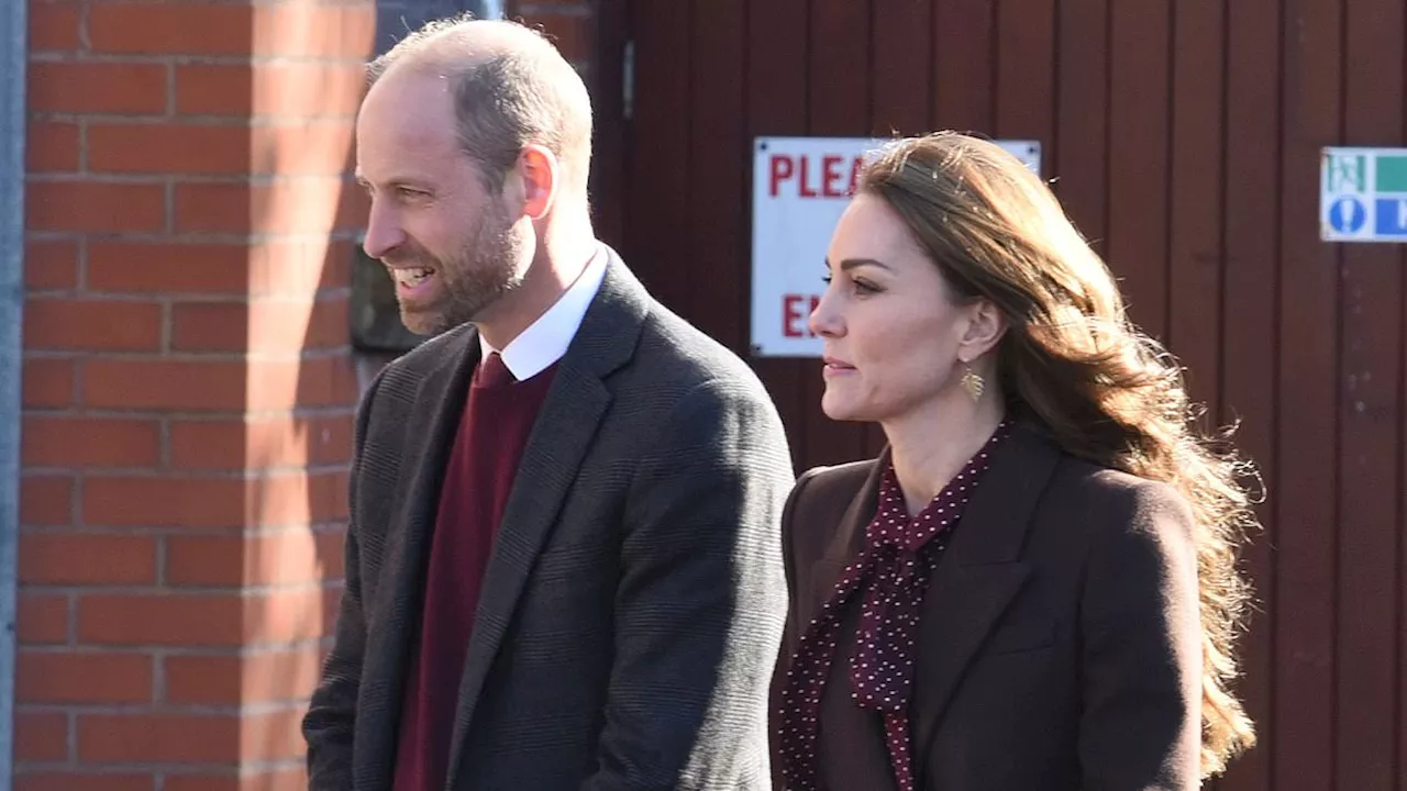 Kate Middleton goes without her sapphire wedding ring as she sports 'eternity band' during Southport...