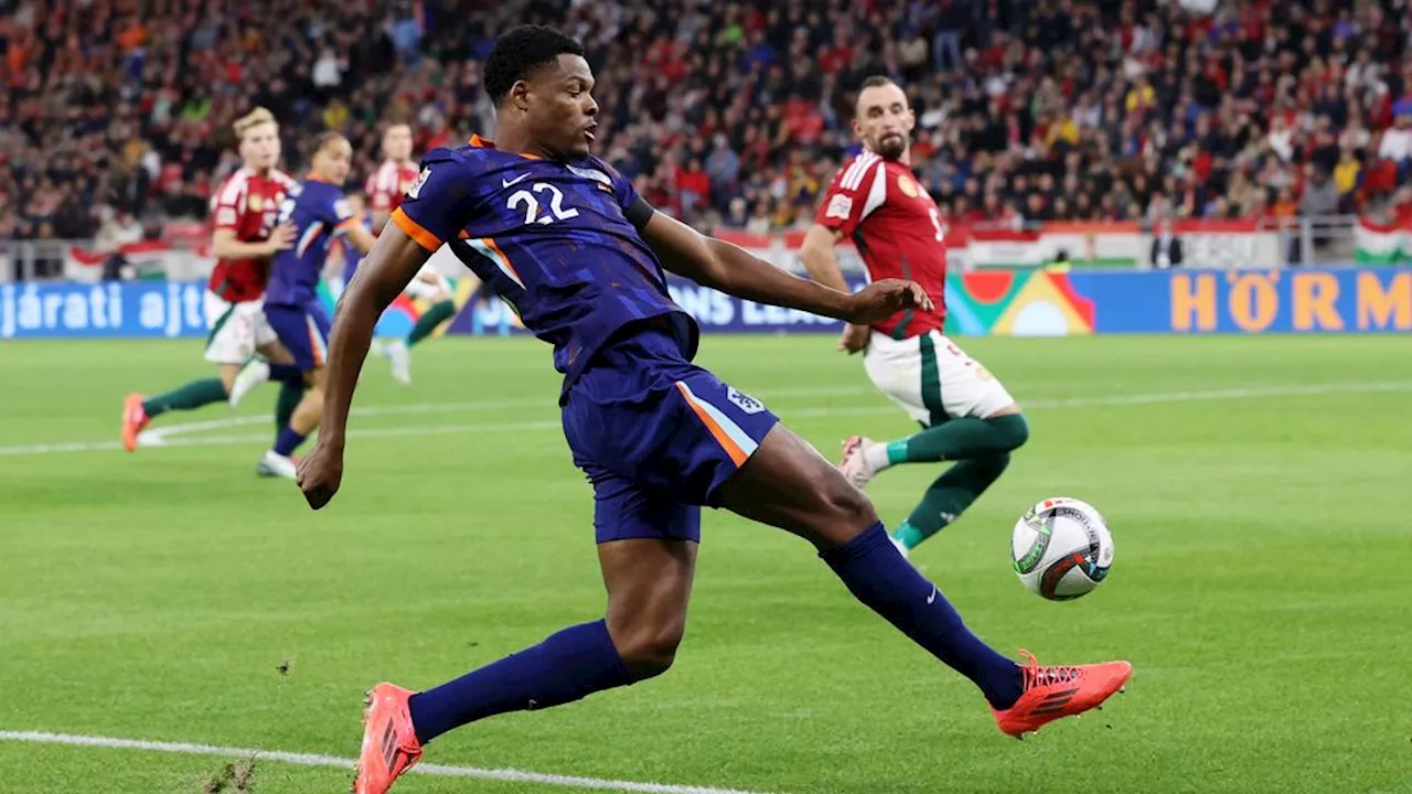 Oranje scoort pas na rood Van Dijk tegen defensief Hongarije: 1-1