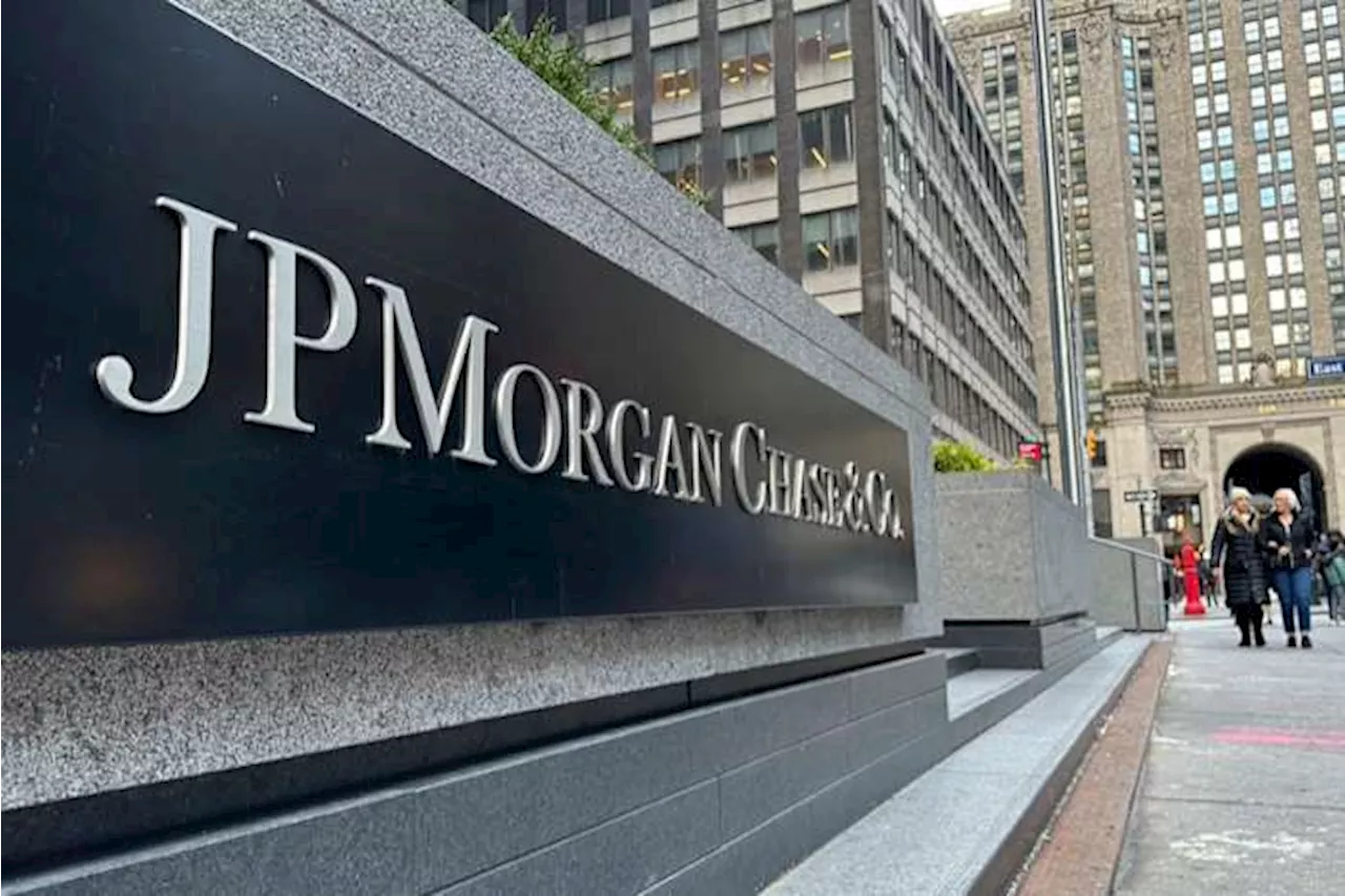 JPMorgan net income falls as bank sets aside more money to cover potential bad loans