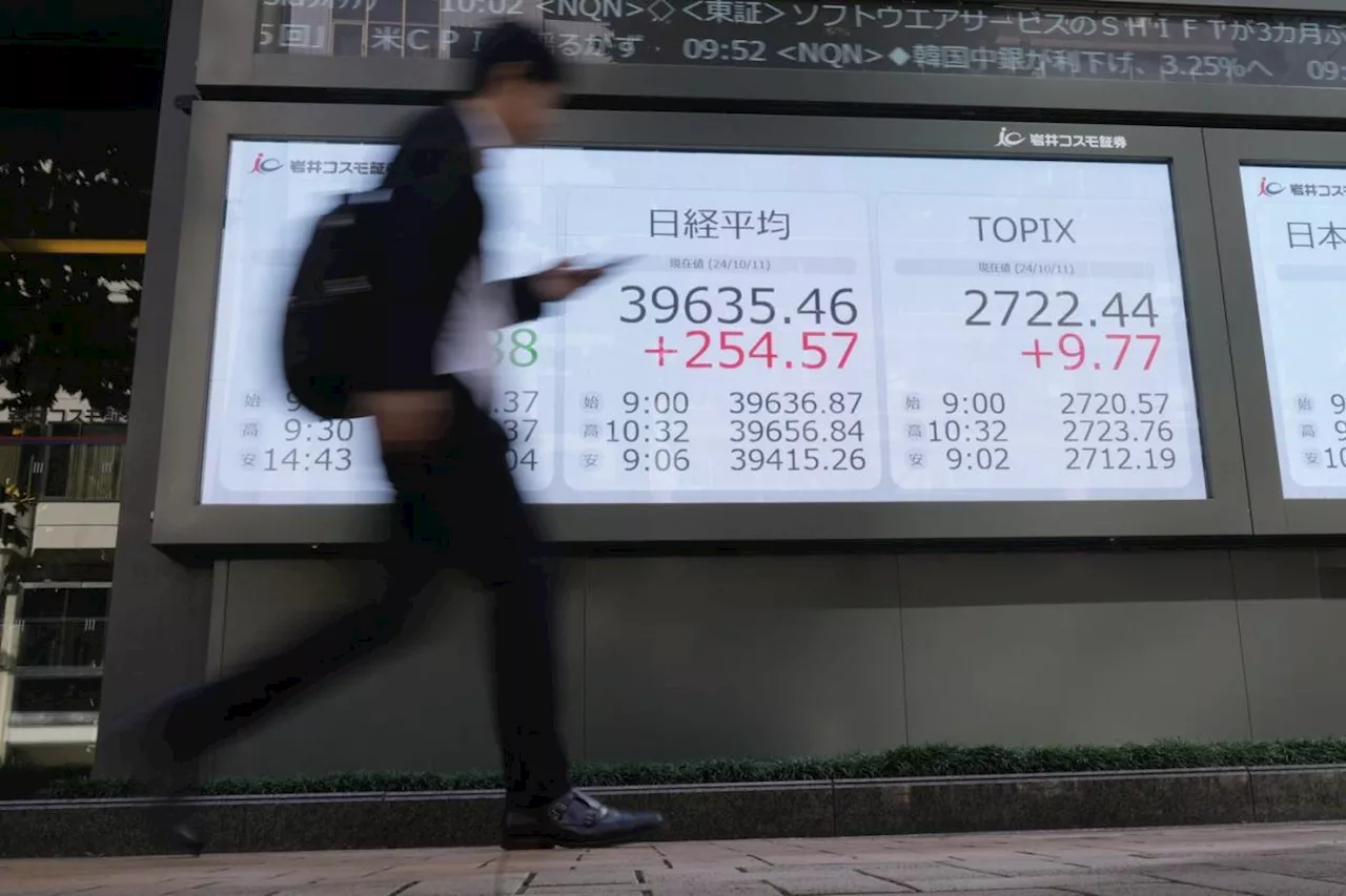 Asian stocks mixed as markets wait for China policy briefing