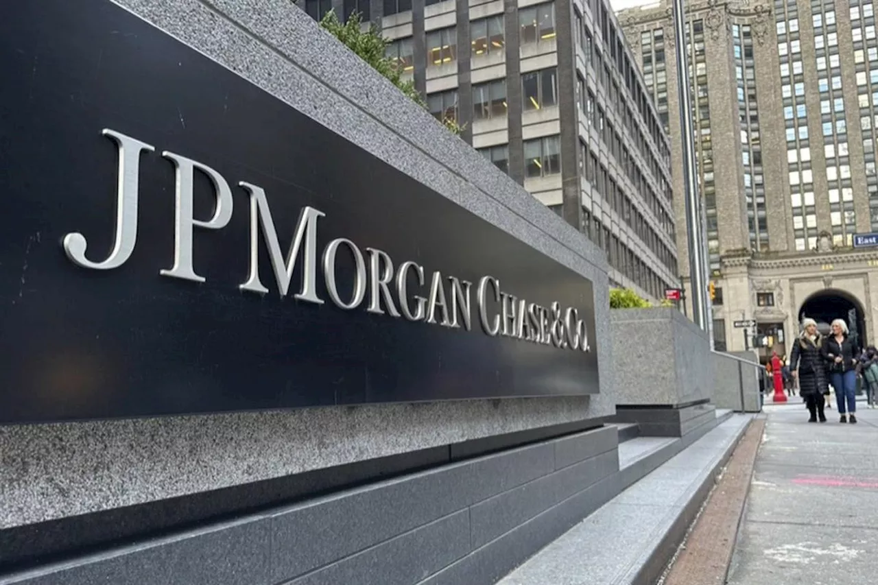 JPMorgan net income falls as bank sets aside more money to cover potential bad loans