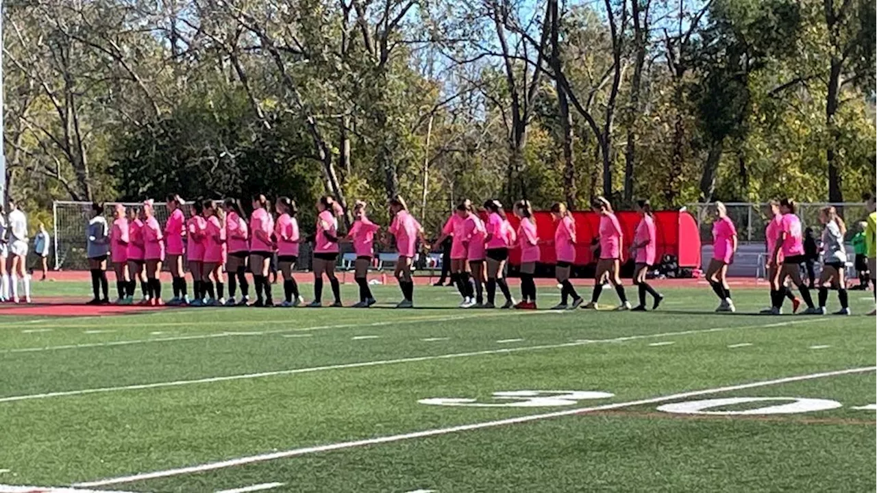 Hilton and Aquinas soccer teams rally for annual 'Kick Out Cancer' game