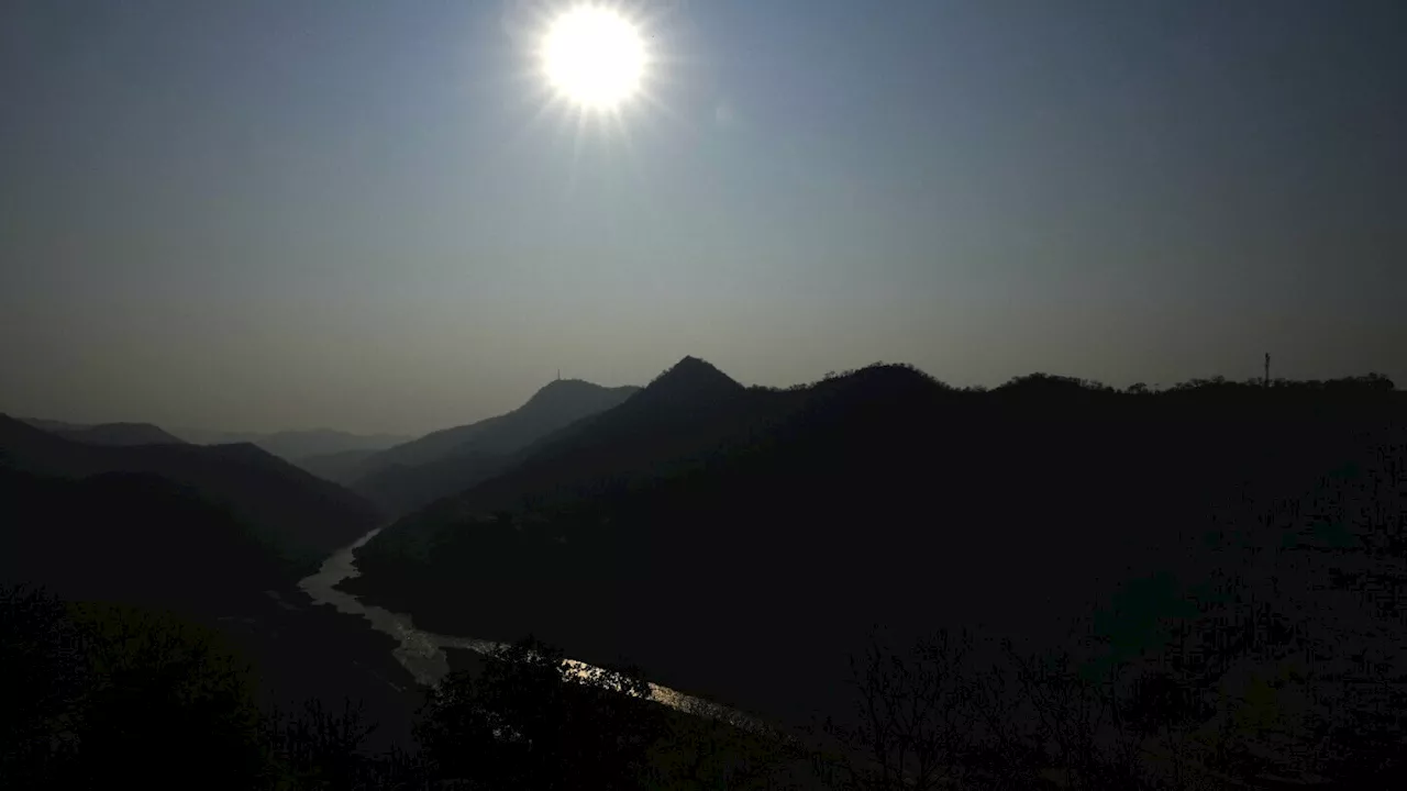 Drought is parching the world's largest man-made lake, stripping Zambia of its electricity