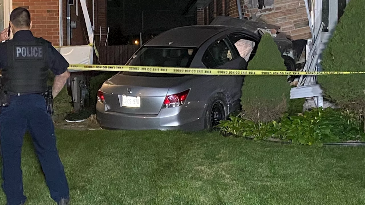 Stolen vehicle crashes into two homes in North York, police say