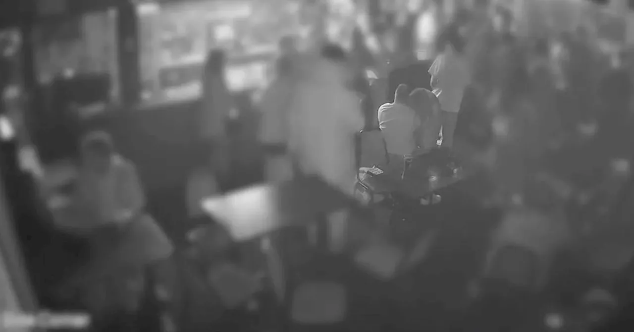 Shocking moment violent thug headbutts partner in crowded pub captured on CCTV