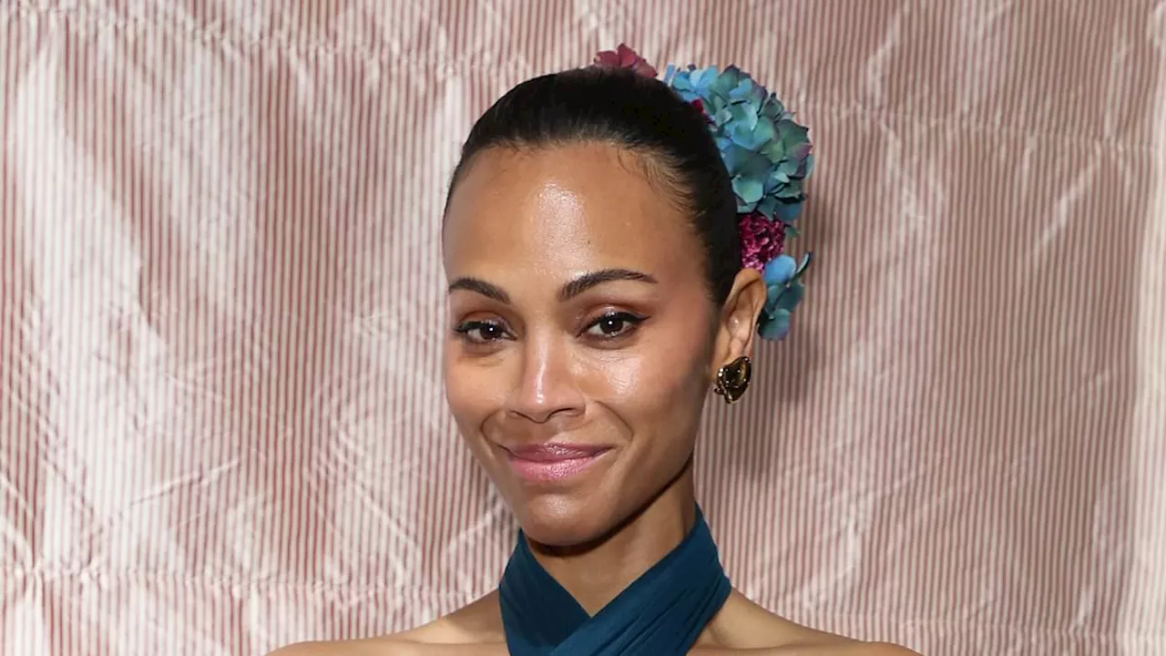 Zoe Saldana stuns in a halterneck top and pencil skirt at Emilia Perez premiere afterparty during...