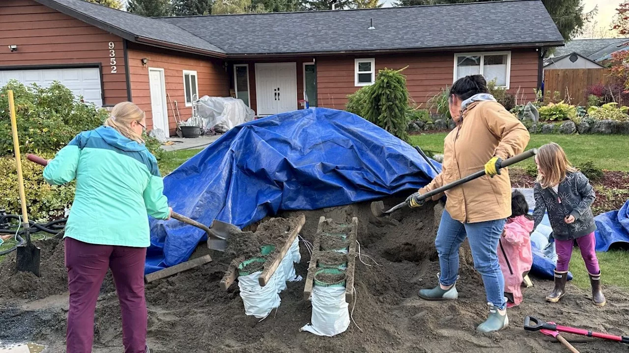 Community groups have stepped up to do flood preparation, but anxiety remains as the threat of a fall flood looms