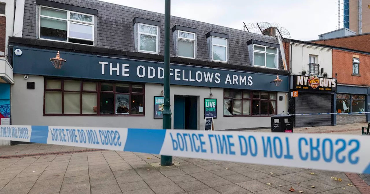 Pub cordoned off after thugs smash windows and throw flaming bottles inside