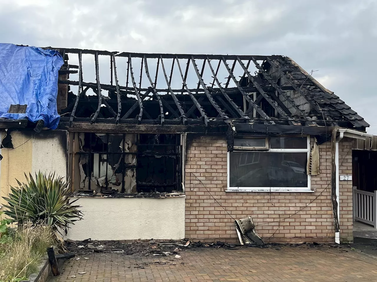 Woman remains in hospital after fire tears through Newport bungalow overnight