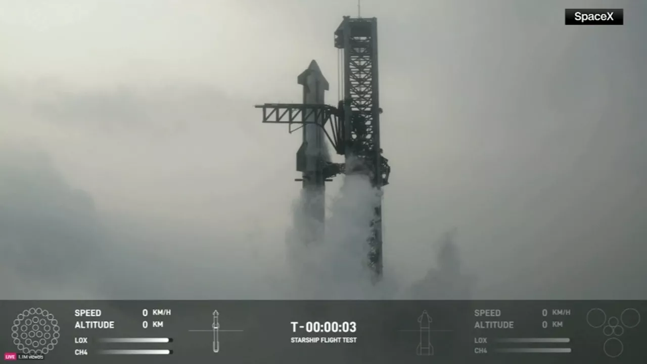 In an engineering feat, mechanical SpaceX arms catch Starship rocket booster at landing pad