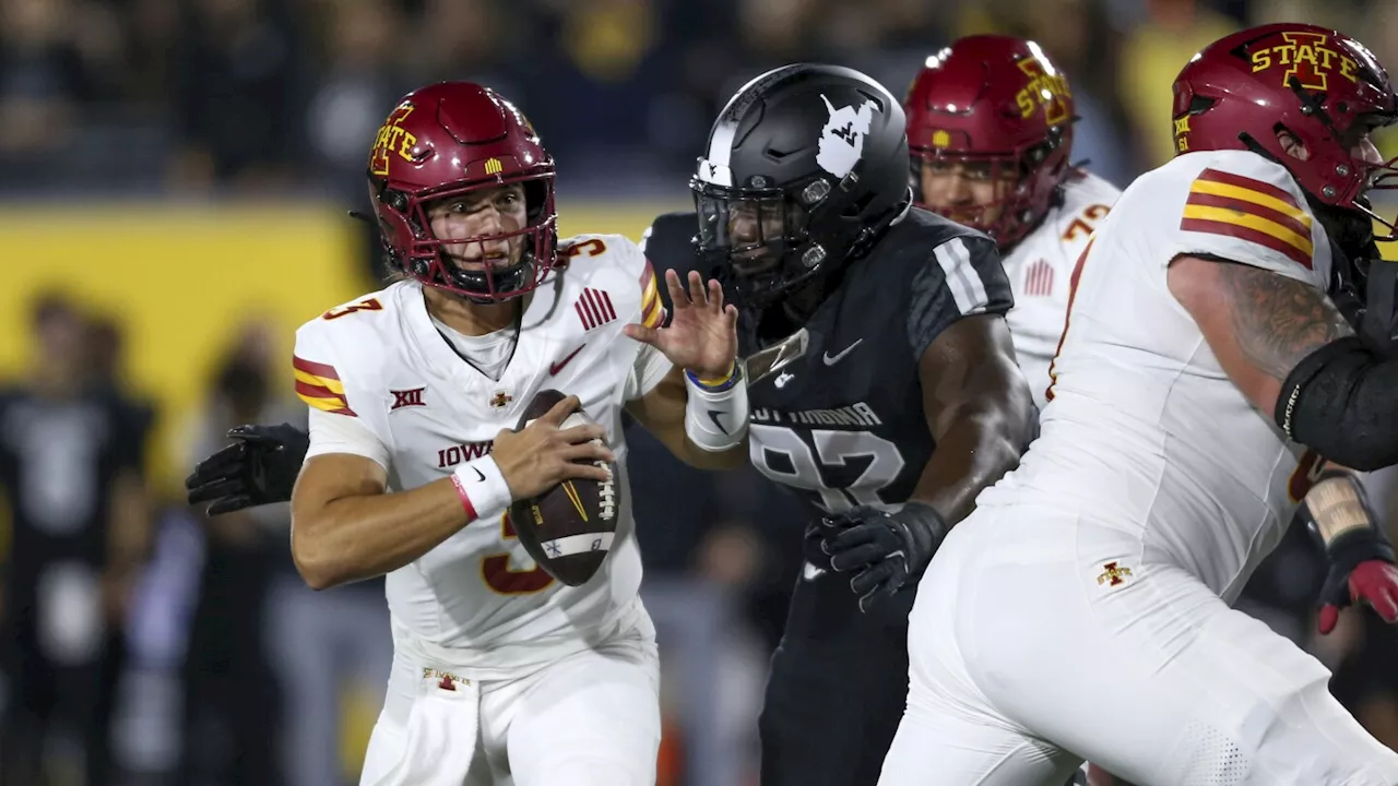 Becht, Hansen lead No. 11 Iowa State over West Virginia 28-16 for first 6-0 start since 1938