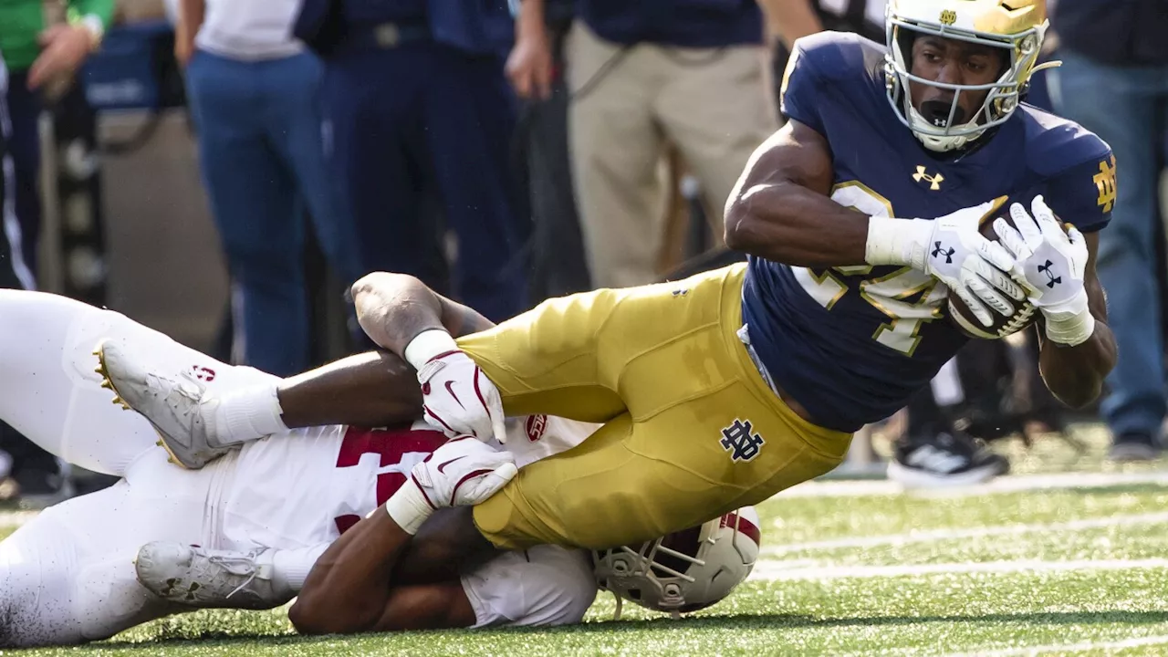 Leonard throws 3 TD passes and runs for another score as No. 11 Notre Dame beats Stanford 49-7