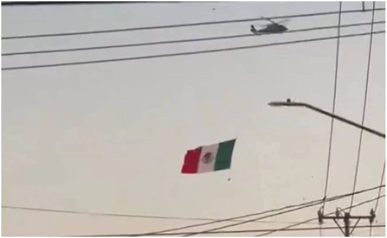 Helicóptero ondea bandera nacional en cielo de Culiacán; es parte de ceremonia por arranque de Liga Mexicana del Pacífico