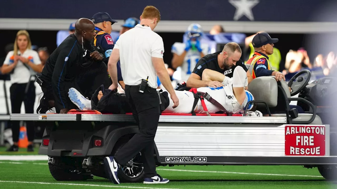 Lions' Aidan Hutchinson carted off with apparent serious leg injury