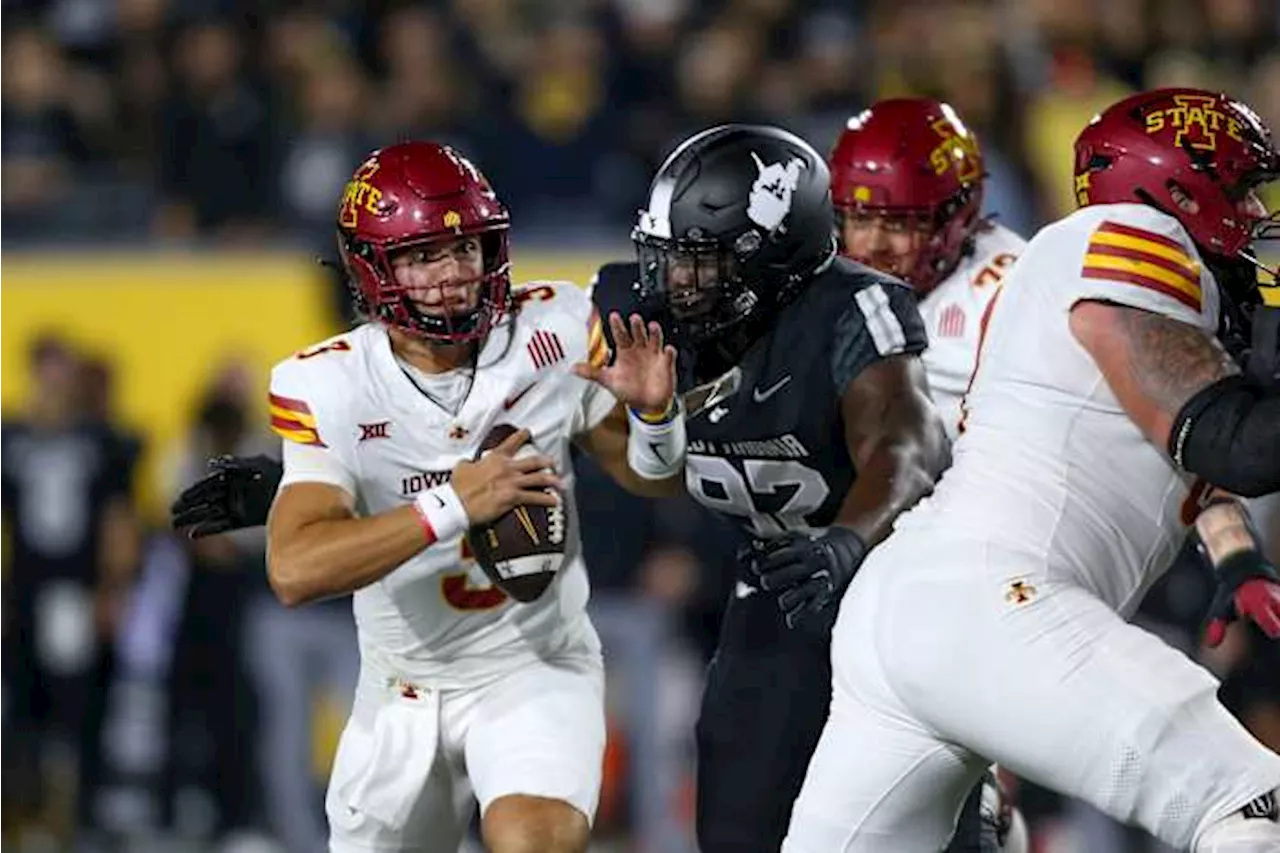 Becht, Hansen lead No. 11 Iowa State over West Virginia 28-16 for first 6-0 start since 1938