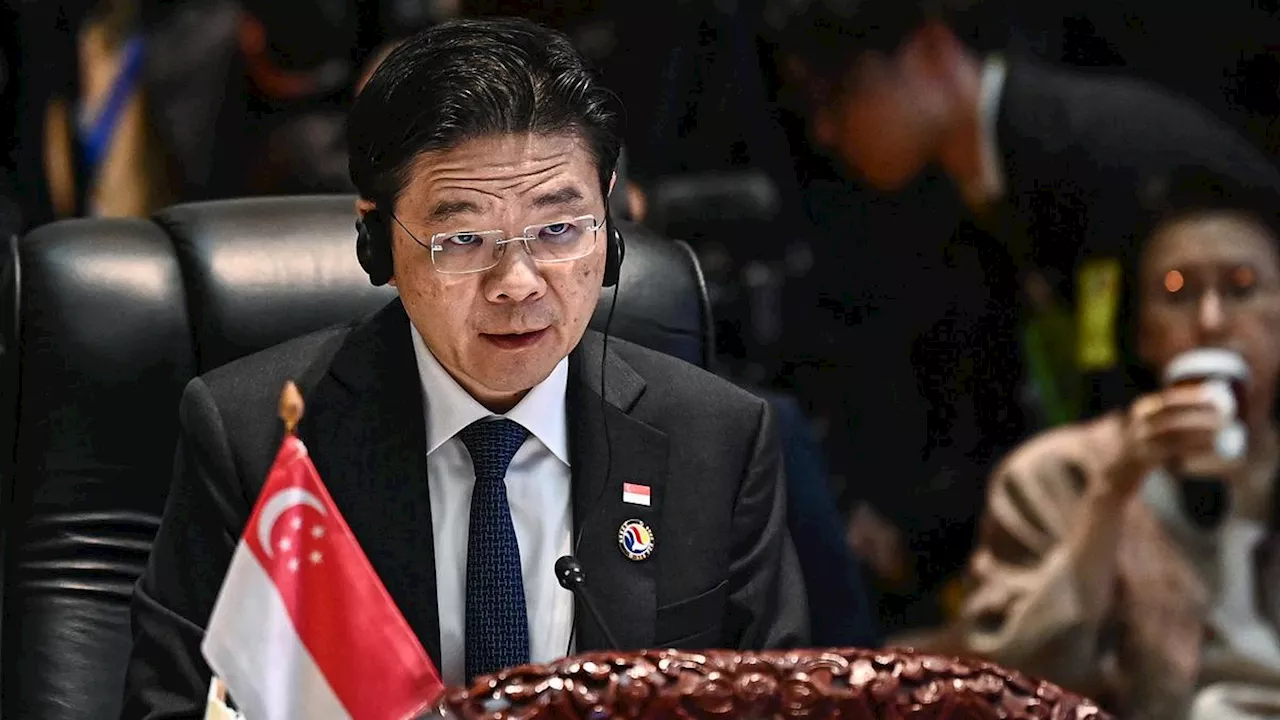 PM Singapura Lawrence Wong Pulang Kampung Naik Pesawat Kelas Ekonomi dari Laos