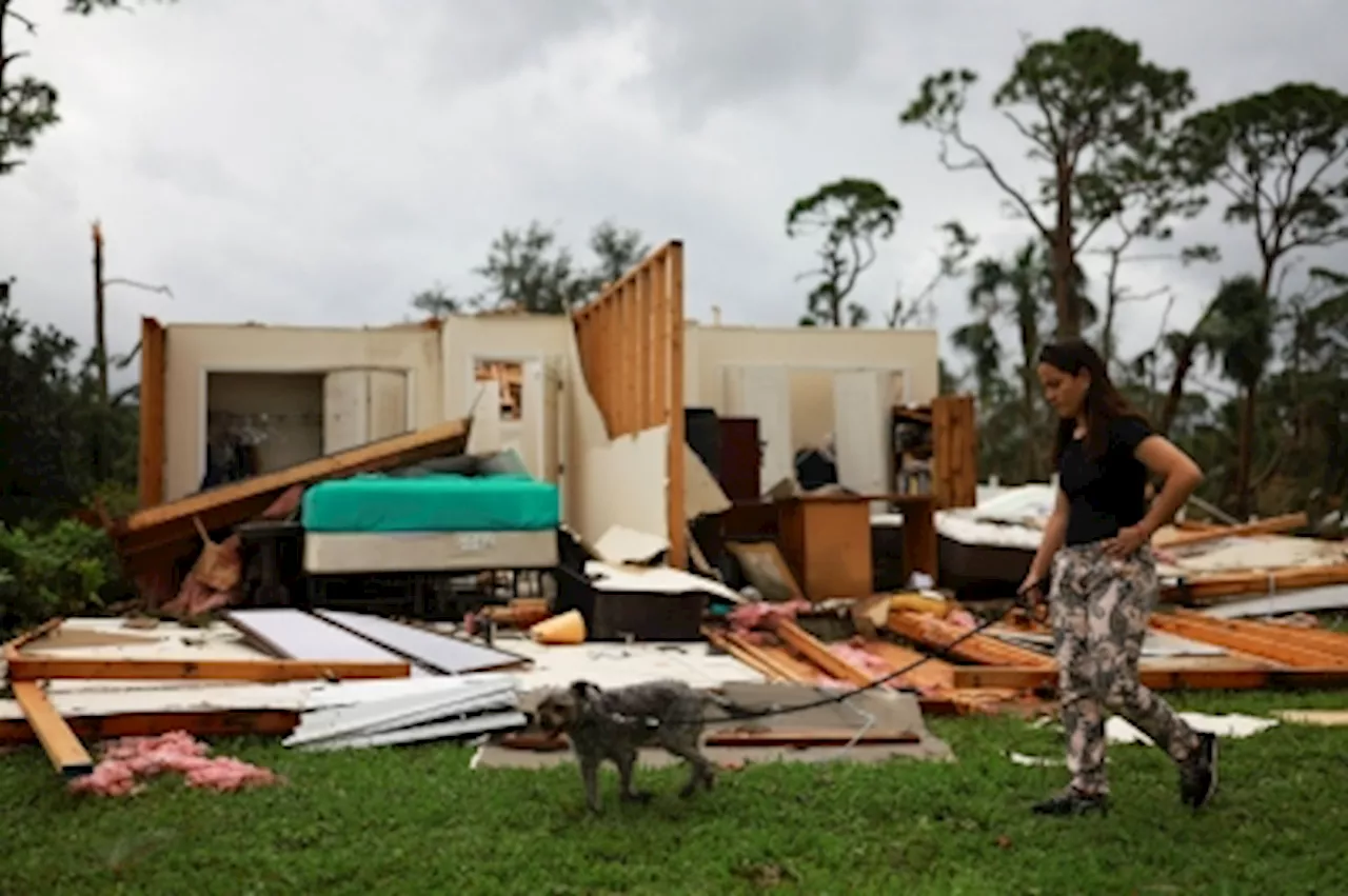 ‘Paradise is still paradise’: Floridians vow to rebuild after two hurricanes’ wrath