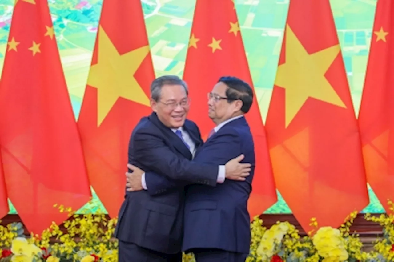 Vietnam and China ink deals on agriculture, QR payments, and railways during Premier Li Qiang’s Hanoi visit