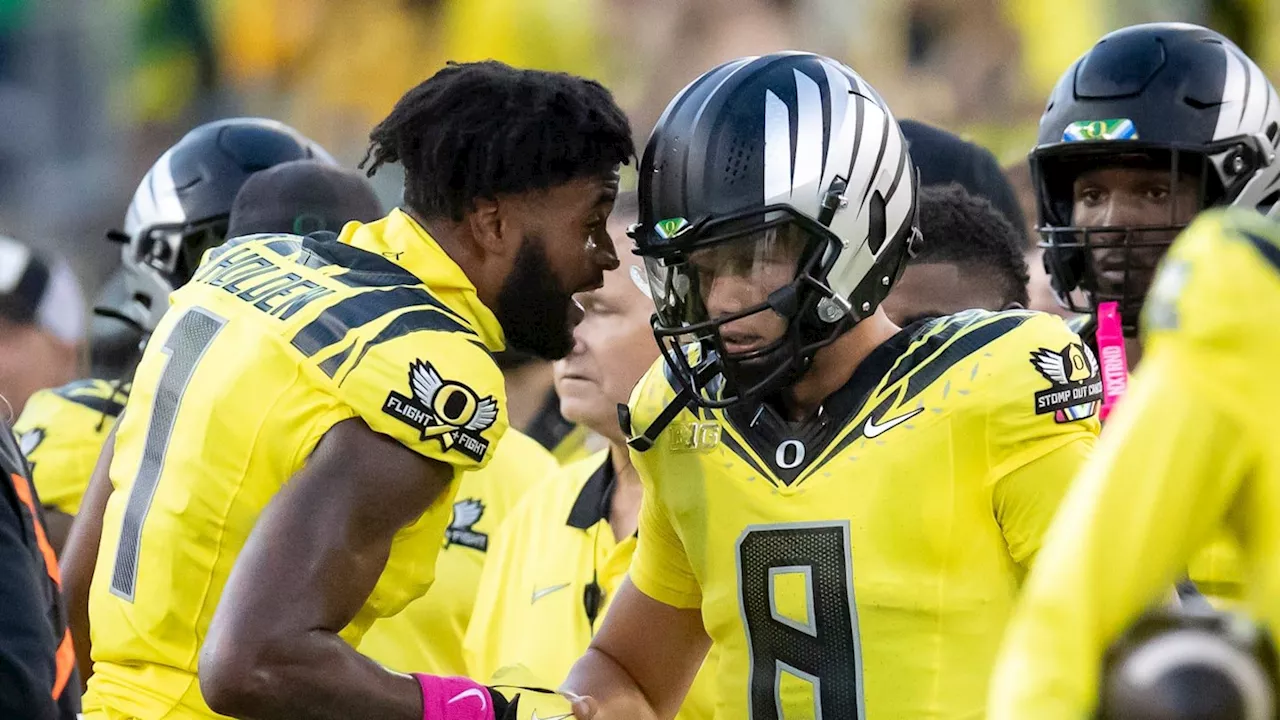 Oregon Ducks Traeshon Holden Ejected, Spits in Ohio State Defender's Face: WATCH