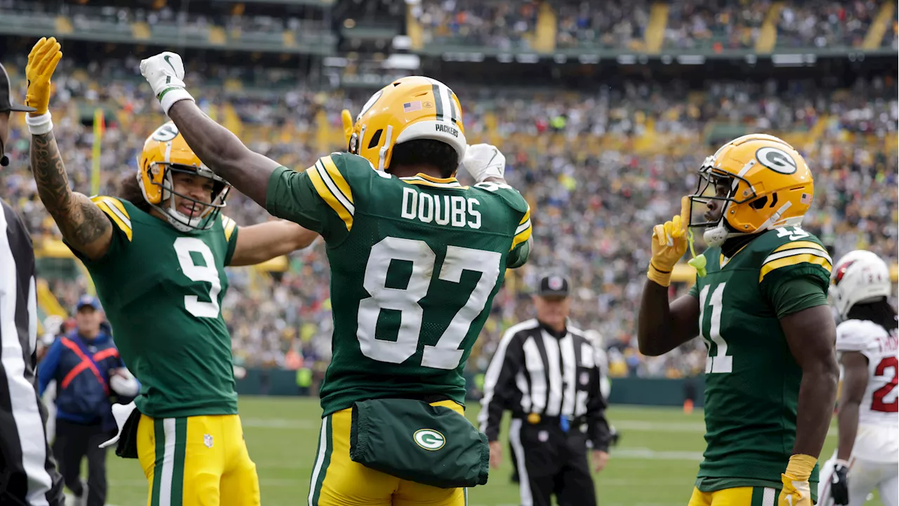 Doubs catches two TD passes in return from suspension to help Packers rout Cardinals