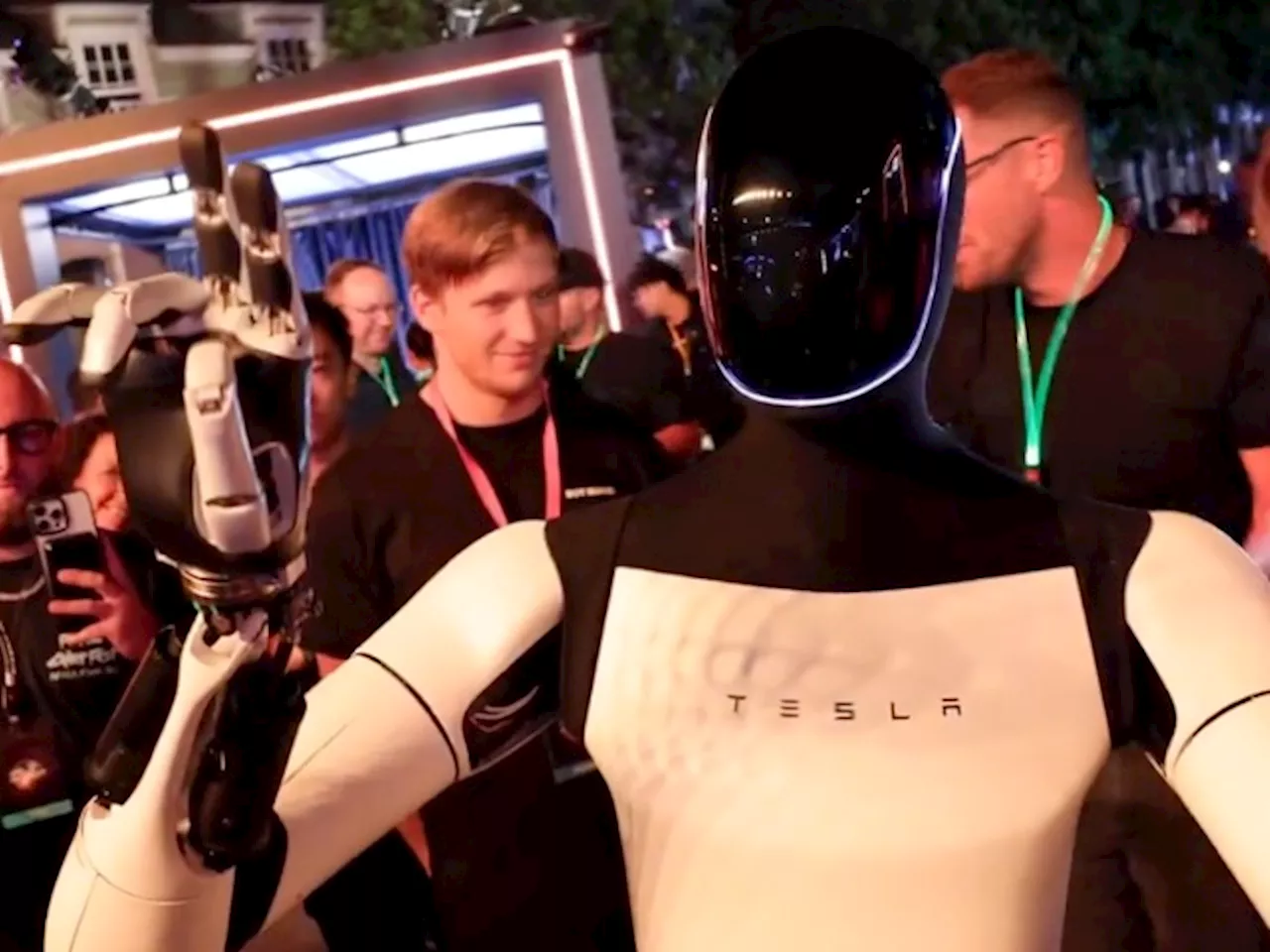 Elon Musk’s Optimus Bot Stunned At Tesla ‘We, Robot’ Event, But Were Actually Humans In Disguise