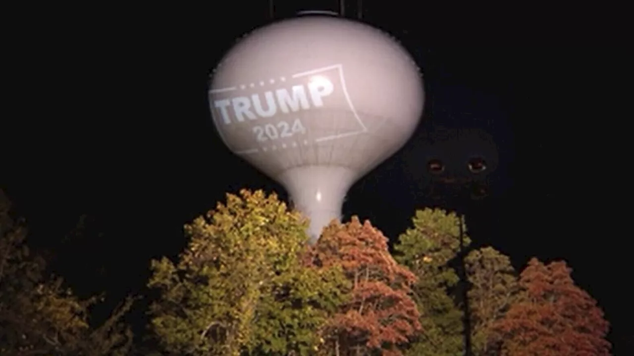 Town fines resident who projected Trump sign onto municipal water tower