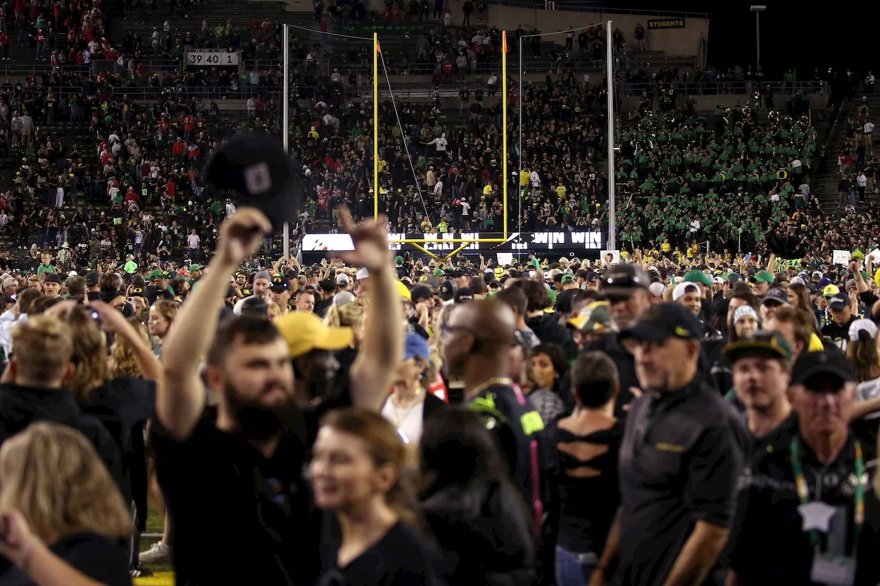 Did the Big Ten fine Oregon after fans stormed the field to celebrate win vs. Ohio State football?