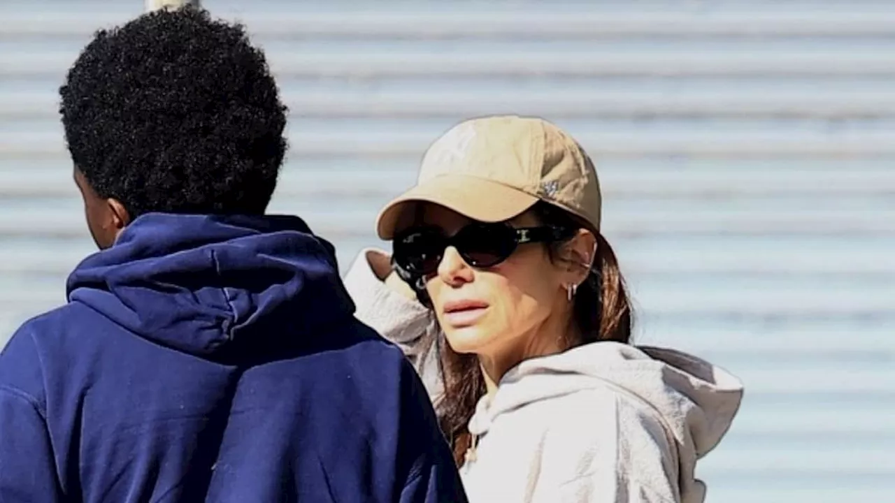 Sandra Bullock's son Louis, 15, towers over her on rare outing in LA