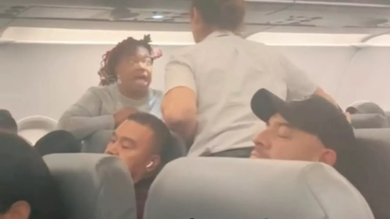 Wild moment Frontier Airlines passenger claims she is a 'president and sovereign ruler' as she...