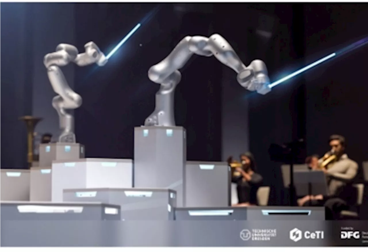 Robot conductor with three arms leads Dresden orchestra in groundbreaking performance