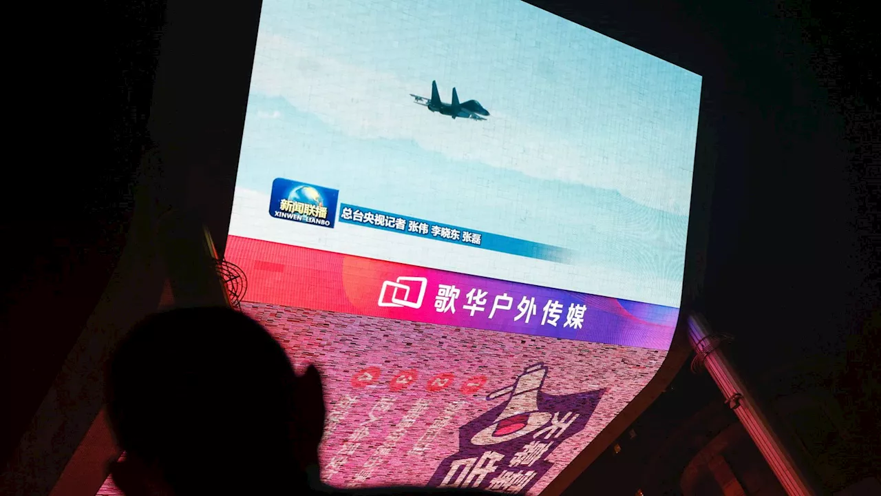 Taiwan says 'record' 125 Chinese aircraft and 17 warships involved in military exercise