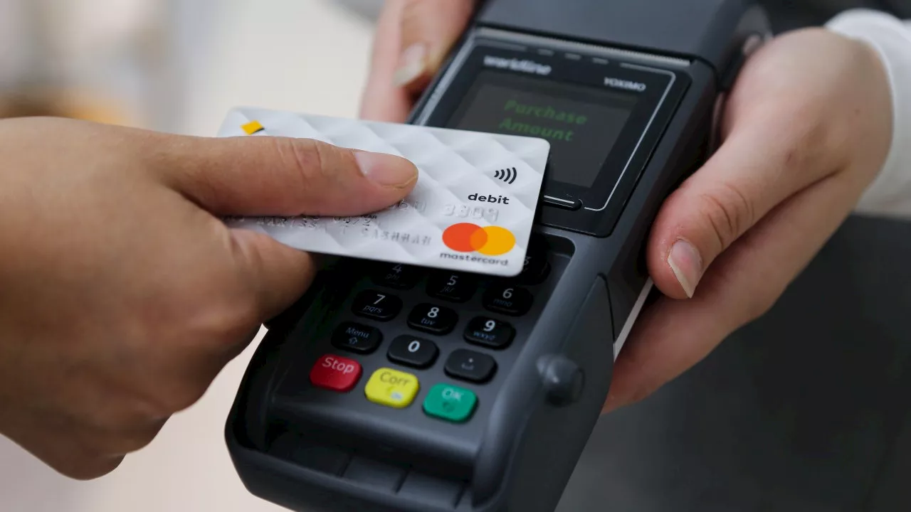 Labor eyes crackdown on debit card surcharges