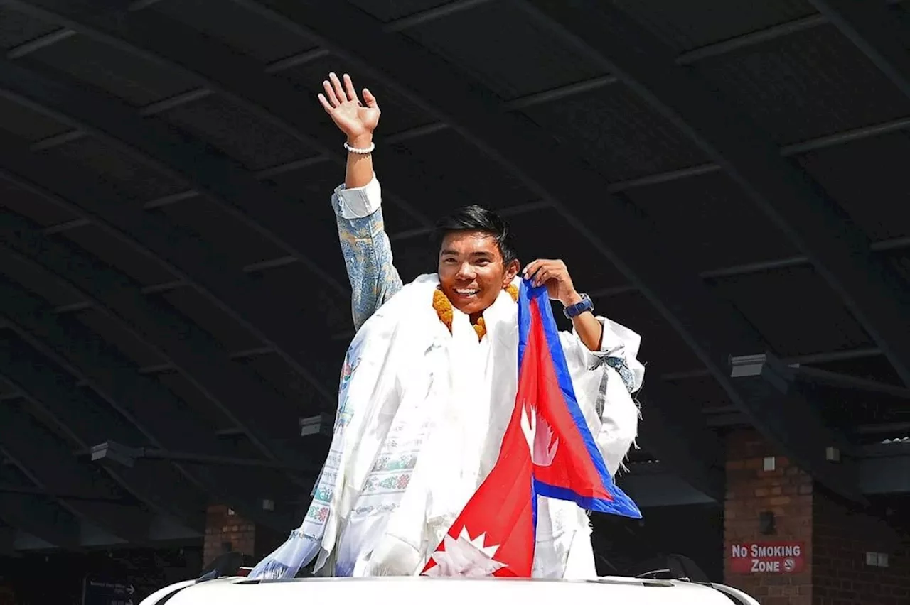 Record-setting Nepali teen climber gets hero's welcome