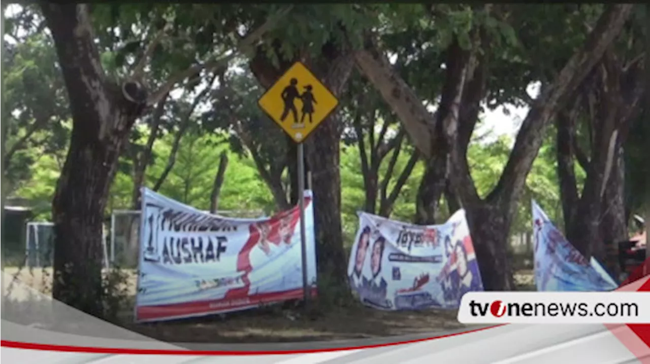 Pemasangan Banner Sosialisasi Paslon Bupati dan Wakil Bupati Dipaku di Pohon, KPU Nganjuk Dikecam Warga